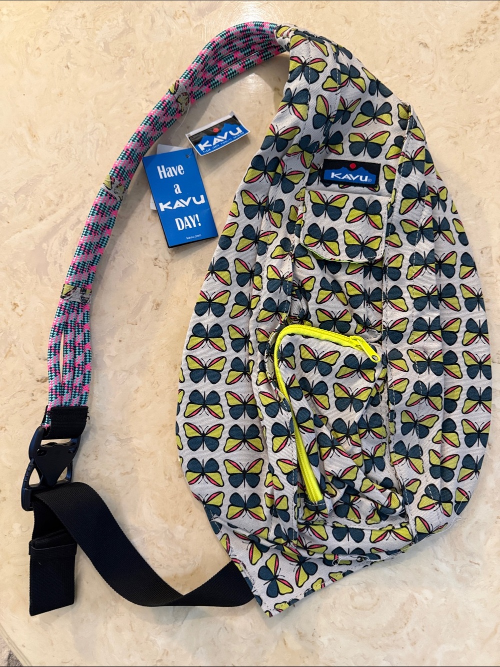 Kavu Sling Bag in butterfly print with Neon Yellow zippers